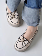 Elegant Cream Bow Loafers with Rhinestone Accents – Contrast Piping Design For Women