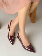 Women's Cherry Patent Pointed-Toe Slingback Heels with Mary Jane Strap and Gold Buckle Detail